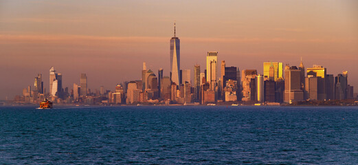 Naklejka premium Lower Manhattan with Freedom Tower. World Trade Center over Hudson river. NY with World Trade Center tower.