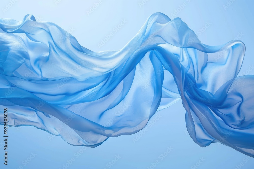 Poster A close-up of blue fabric blown by the wind, suitable for use in weather or textile-related contexts