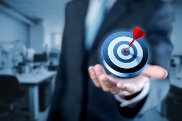 Businessman showing target board icon