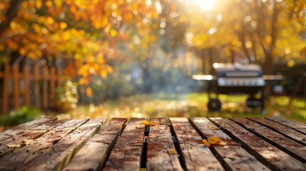 A serene outdoor scene with autumn leaves and a barbecue grill in the background.
