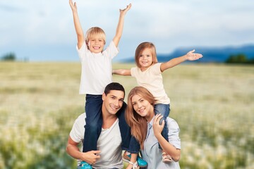 Fototapeta premium Happy young family with children have fun together,