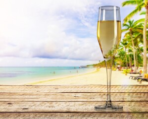 A flute glass with sparkling champagne on bright color
