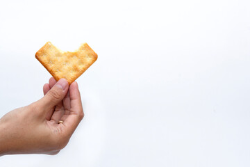 Malkist cracker dust between the layers, the surface of which is coated or sprinkled with sugar