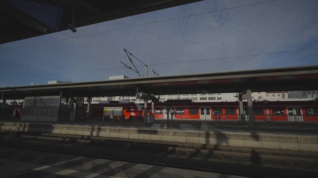 Munchen Ost or Ostbahnhof. Munich eastern railway station. Platfoms of railroad station Ost bahnhof. Munich East train station. Bahnhof Munchen Ost. Railroad and public transporation in Deutschland. 