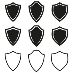 Set of shield icons. Minimalist shield shapes. Vector security symbols. Black and white style.