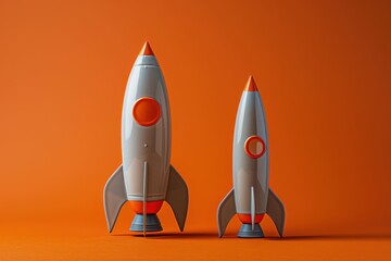 Two vibrant toy rockets on a bold orange background, representing the excitement of space travel and exploration