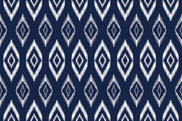 African Ikat paisley seamless pattern.geometric ethnic oriental pattern traditional on blue background.Aztec style abstract vector illustration.