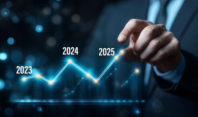 Obraz premium Businessman pointing arrow graph corporate future growth plan, new year 2025