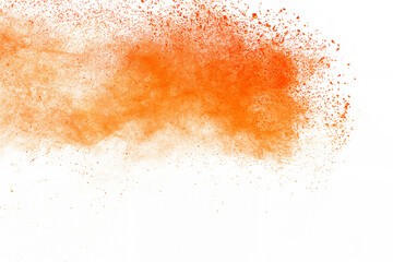 Abstract Orange Powder Explosion, Close-up of Dust Particle Splash on White Background