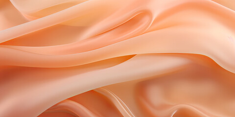 Fototapeta premium A close-up of a peach silk fabric with smooth and soft texture. The fabric is draped in a beautiful wave pattern.
