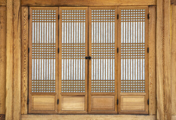 Jongno-gu, Seoul, South Korea - May 12, 2022: Front view tile house with paper door and wood frame at Blue House