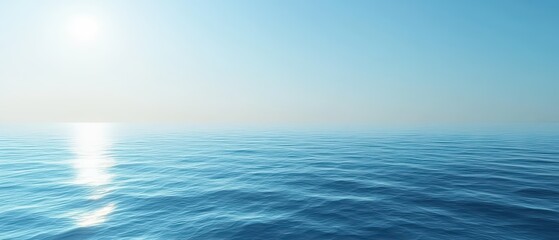 A tranquil blue ocean scene with soft waves and a clear sky