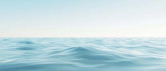 Fototapeta premium A tranquil blue ocean scene with soft waves and a clear sky