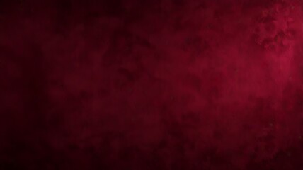 Fototapeta premium Deep red textured background suitable for dramatic designs, festive themes, romantic concepts, fashion editorials, and bold branding projects.