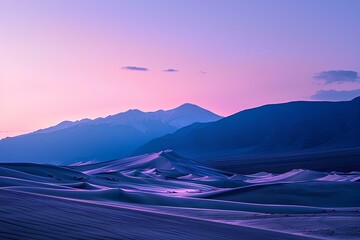 Great Sand Dunes National Park at sunrise, a towering sand dune complex with mountains in the background, a purple sky with orange and blue hues, a beautiful and peaceful landscape 