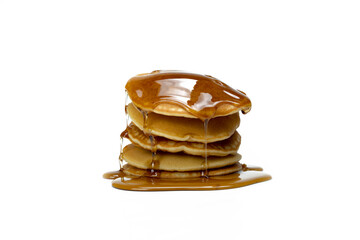 A stack of pancakes with syrup on top