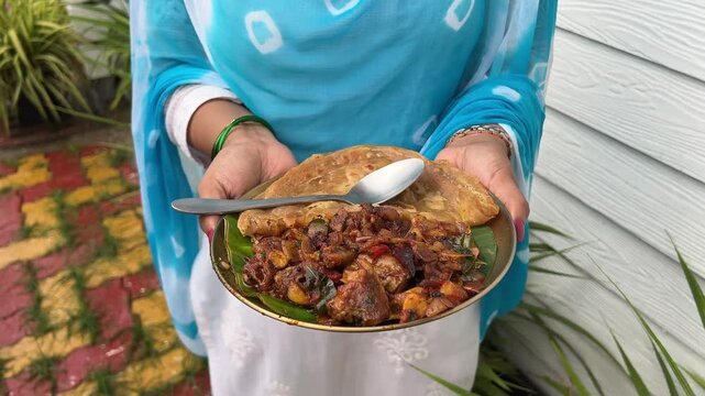 Close up shot of Sukha mutton and paratha a south Indian delicacy.