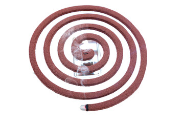 A mosquito coil with smoke coming out of it