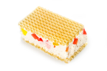 Waffle cake with marmalade on a white background. A close-up of a sweet confectionery.