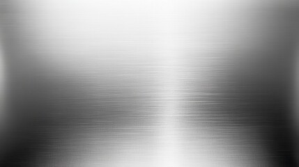 A smooth, reflective metallic surface with subtle brush strokes.