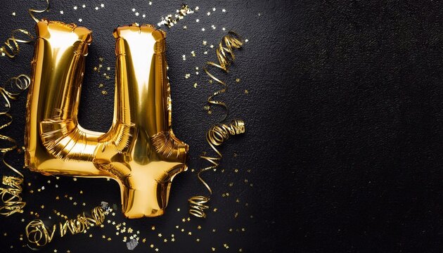 foil number4 on a black background with confetti with space for text
