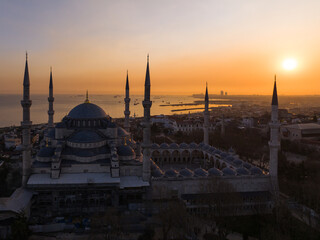 Naklejka premium Blue Mosque (Sultanahmet Camii) in the Sunset Time Drone Photo, Sultanahmet Square Fatih, Istanbul Turkiye (Turkey) 