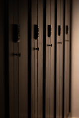 Modern electronic combination locks in an ultra-modern sports club in a big city. Storing things in a locker before a fitness workout. Pilates room. Locker room for athletes in a big city. Sports.