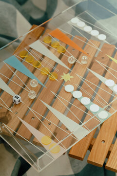 Colorful backgammon game on a wooden surface