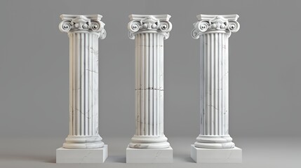 Three classical marble columns with intricate designs and fluted surfaces.