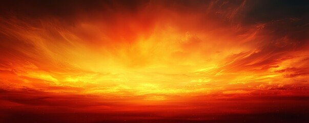 Obraz premium A stunning sunset with vibrant orange and red hues illuminating the sky, creating a breathtaking natural scene.