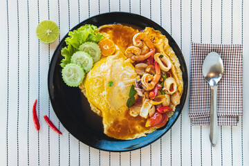 Spicy Tom Yum Kung Omelette, a popular Thai dish with nutritious fusion food.