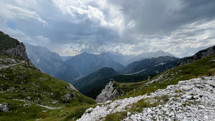 Obraz premium mountains and clouds Mangart Julian Alps 2,679 meters peak hiking nature Slovenia 