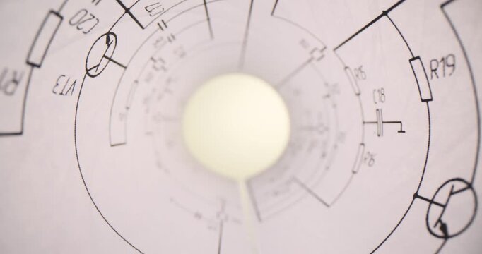 Closeup of circuit diagram on rolling paper