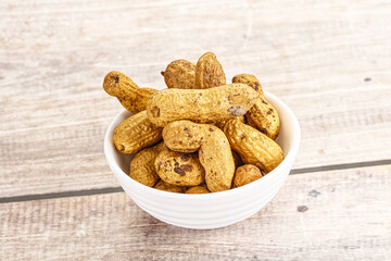 Raw ripe unpeeled peanut heap