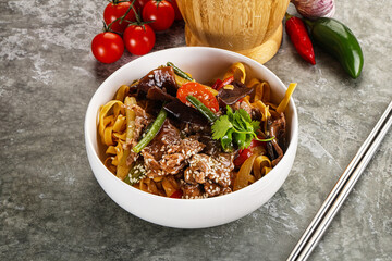 Asian wok with noodle, vegetables and beef