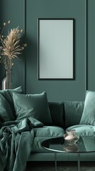 An empty black wood picture frame mockup sits on a green velvet couch in a modern living room. The frame is centered on the couch and is surrounded by plush pillows and a throw blanket
