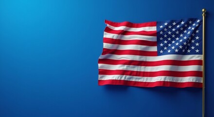 Obraz premium American flag on blue backdrop, symbolizing freedom and unity, excellent for Labor Day promotions, copy space available for messaging.