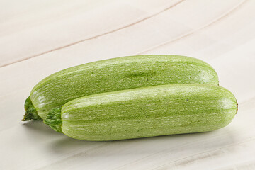 Raw green ripe zucchini vegetable