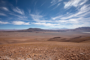 Driving east on Route 27 in the Atacama Desert you see amazing sights like the stunning views across the “Monges de La Pacana” from the Paso Jama, Chile.