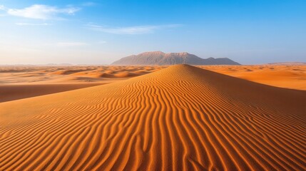 Desert Landscape with Ripples and Mountains in the Background