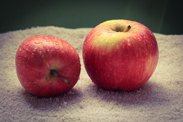 red apples on a wooden table