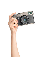 hand holding vintage camera on isolated white background.
