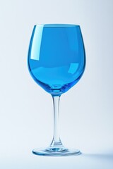 Obraz premium Blue Wine Glass on Table