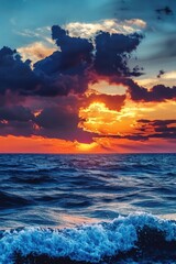 Sunset over ocean with waves