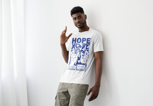 Mockup Of Man In Customized T-Shirt Leaning Against Wall