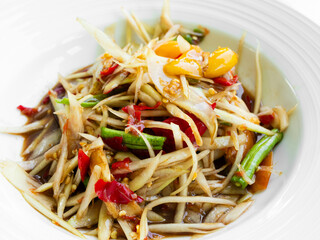 Papaya salad with fermented fish, spicy food asian thailand, fusion cuisine som tum traditional  herb cook.