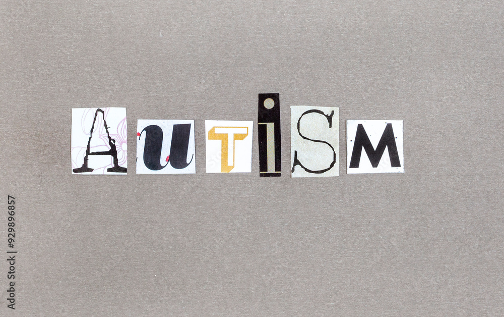 Fototapete The word Autism in magazine snippets on grey background