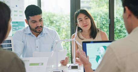 Group diverse Asia businesspeople talk ESG strategies risk management workshop, SDGs report, global...