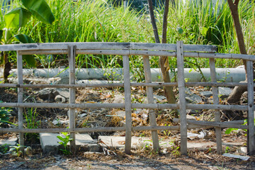 Garden with split bamboo fence