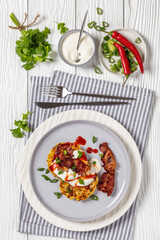 tasty cheese sweet corn pancakes with fried bacon